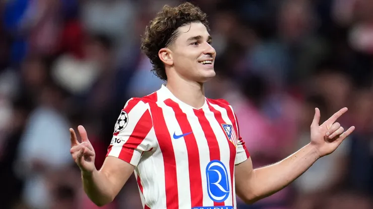 Julian Alvarez of Atletico de Madrid celebrates scoring his team's fifth goal from the penalty spot during the UEFA Champions League 2025/26 League Phase MD2 match between Atletico de Madrid and Eintracht Frankfurt.