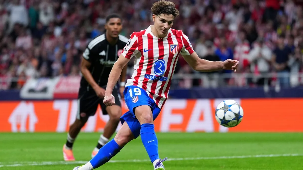 Julian Alvarez of Atletico de Madrid scores his team's fifth goal from the penalty spot during the UEFA Champions League 2025/26 League Phase MD2 match between Atletico de Madrid and Eintracht Frankfurt.
