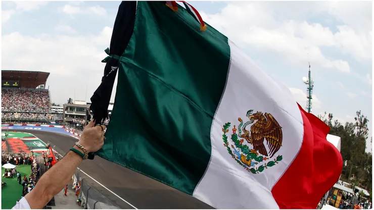 A fan waves a Mexican flag
