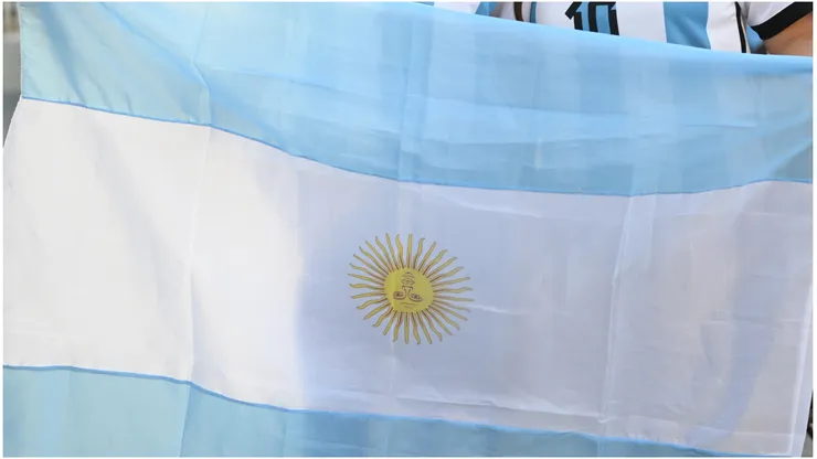 Argentina supporters hold the Argentine flag