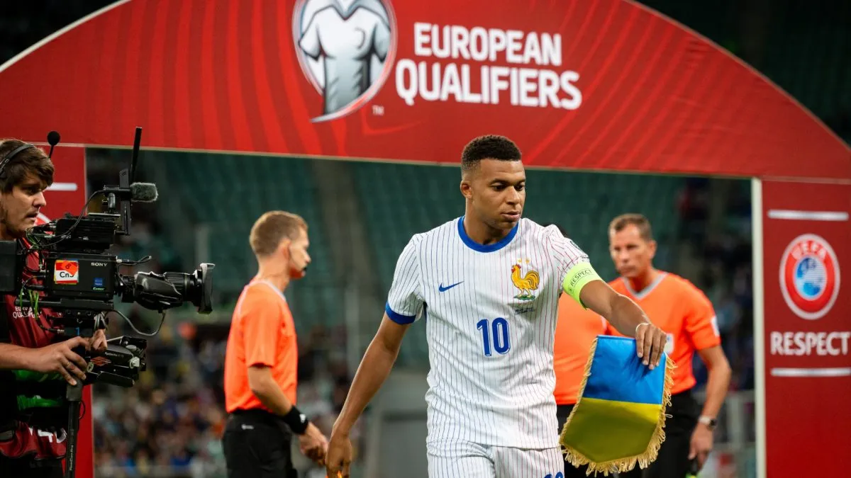 Kylian Mbappe of France seen with Ukraine pennant during the FIFA World Cup 2026 qualifier match between Ukraine and France at Tarczynski Arena on September 5, 2025 in Wroclaw, Poland.
