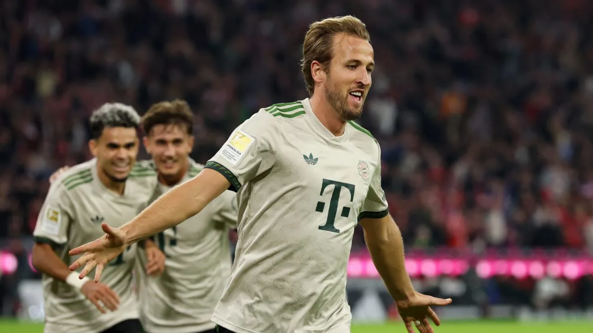 Harry Kane of Bayern Munich celebrates after scoring his team's third goal to reach a record club 100 goals during the Bundesliga match between FC Bayern München and SV Werder Bremen.