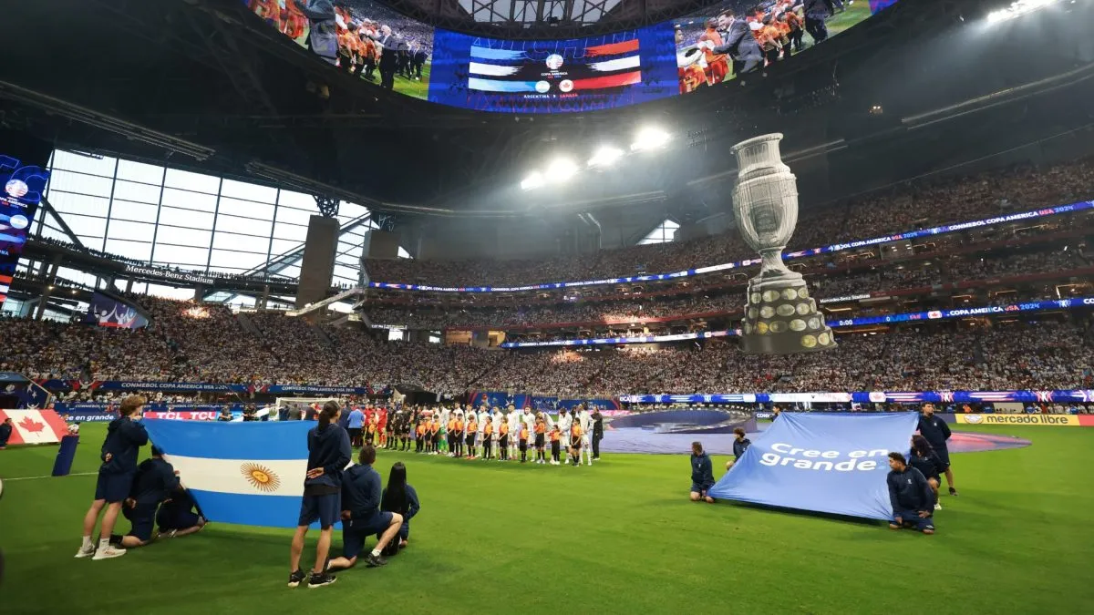 The Canada Team and the Argentina Team line up for the national anthem prior to the CONMEBOL Copa America group A match between Argentina and Canada at Mercedes-Benz Stadium on June 20, 2024 in Atlanta, Georgia.