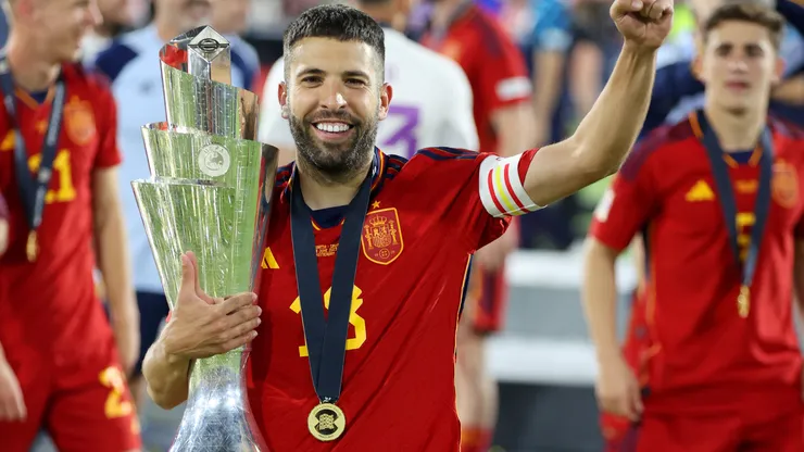 Jordi Alba of Spain poses for a photograph with the UEFA Nations League trophy.