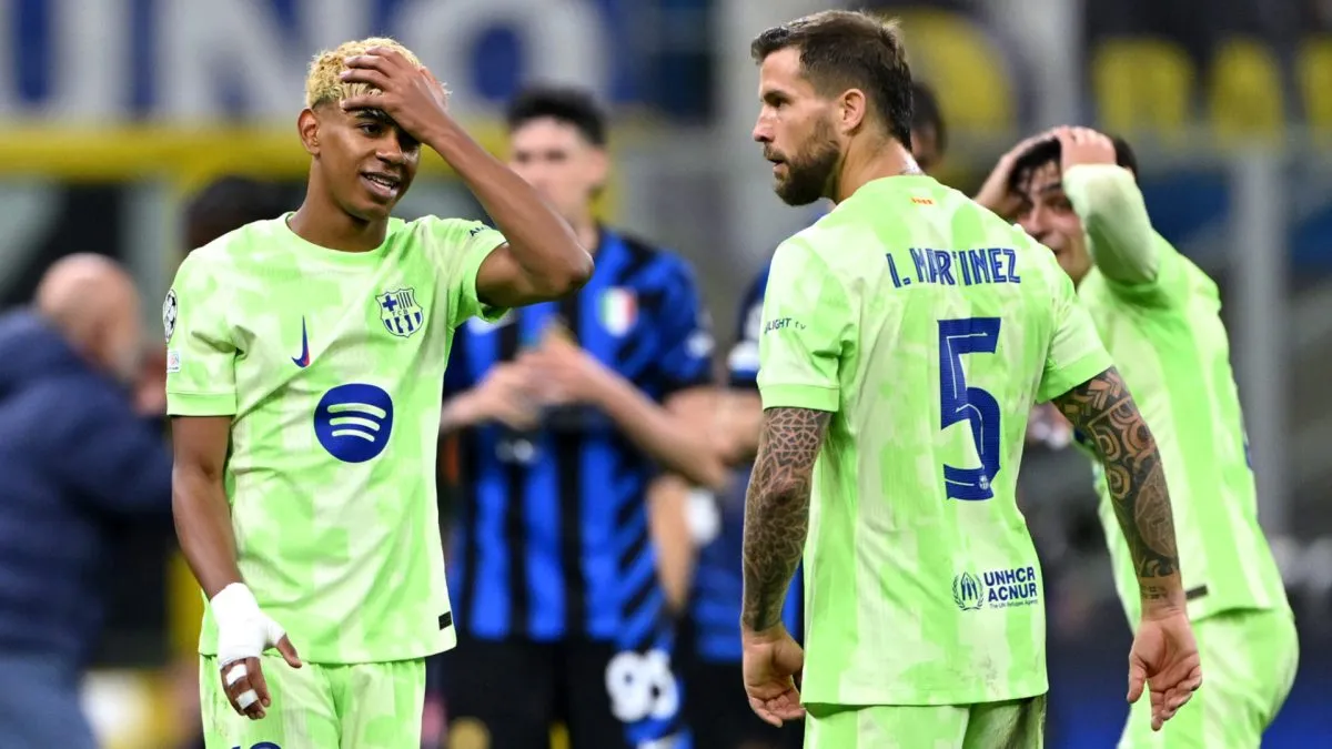 Barcelona's Lamine Yamal and Iñigo Martinez