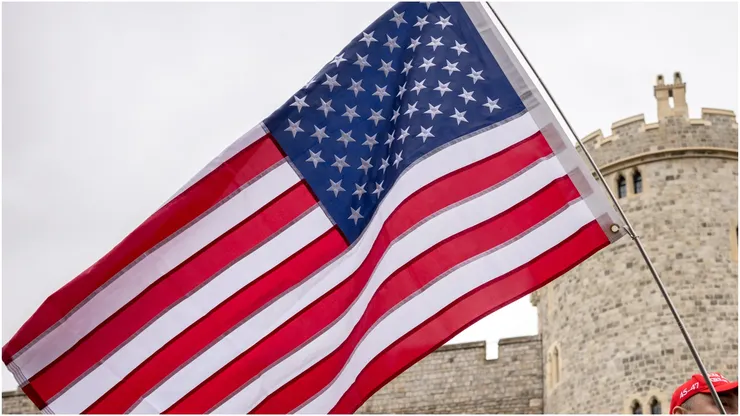A supporter waves a flag of the United States