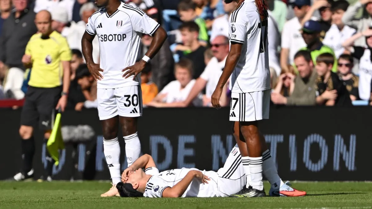 Raul Jimenez of Fulham appears injured on the floor.