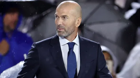 Zinedine Zidane, former French soccer player and manager, leaves the stage.