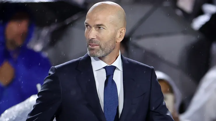 Zinedine Zidane, former French soccer player and manager, leaves the stage.