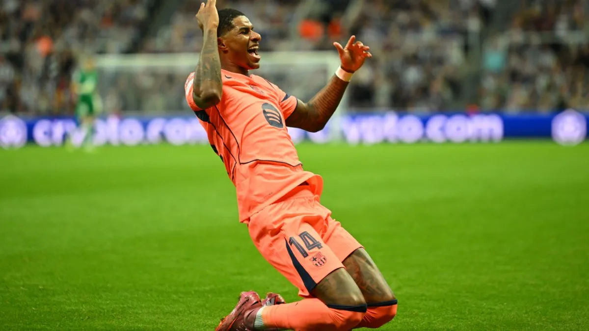 Marcus Rashford celebrating his first goal with Barcelona