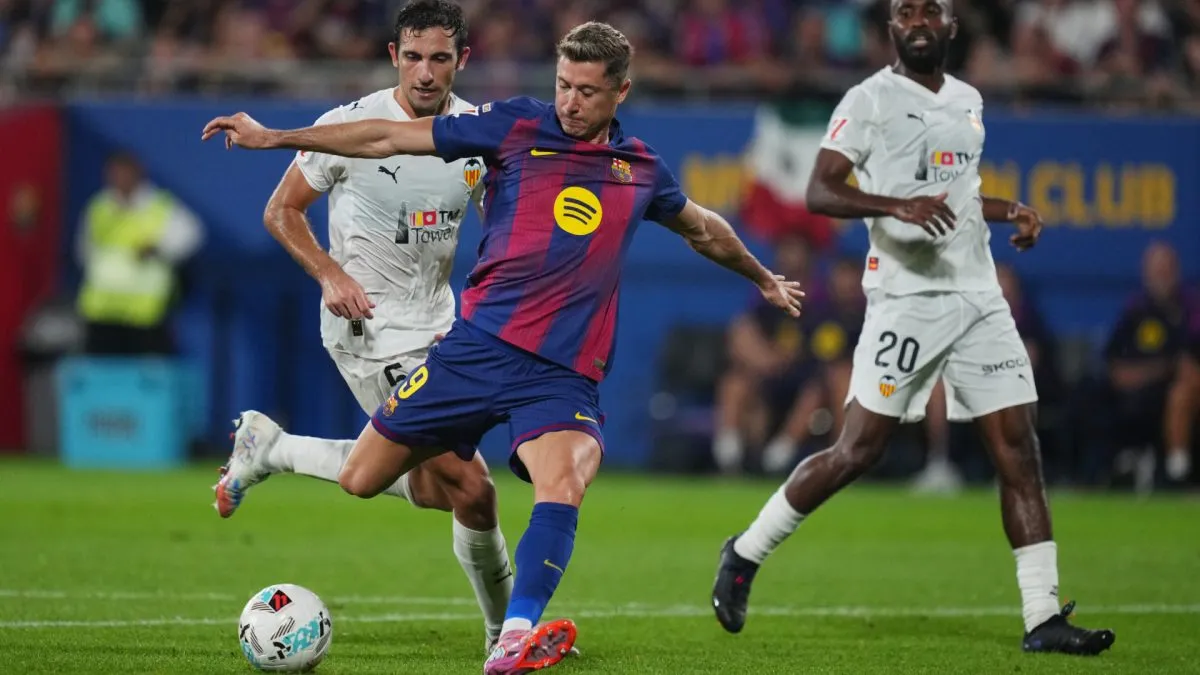 Robert Lewandowski scoring a goal with Barcelona