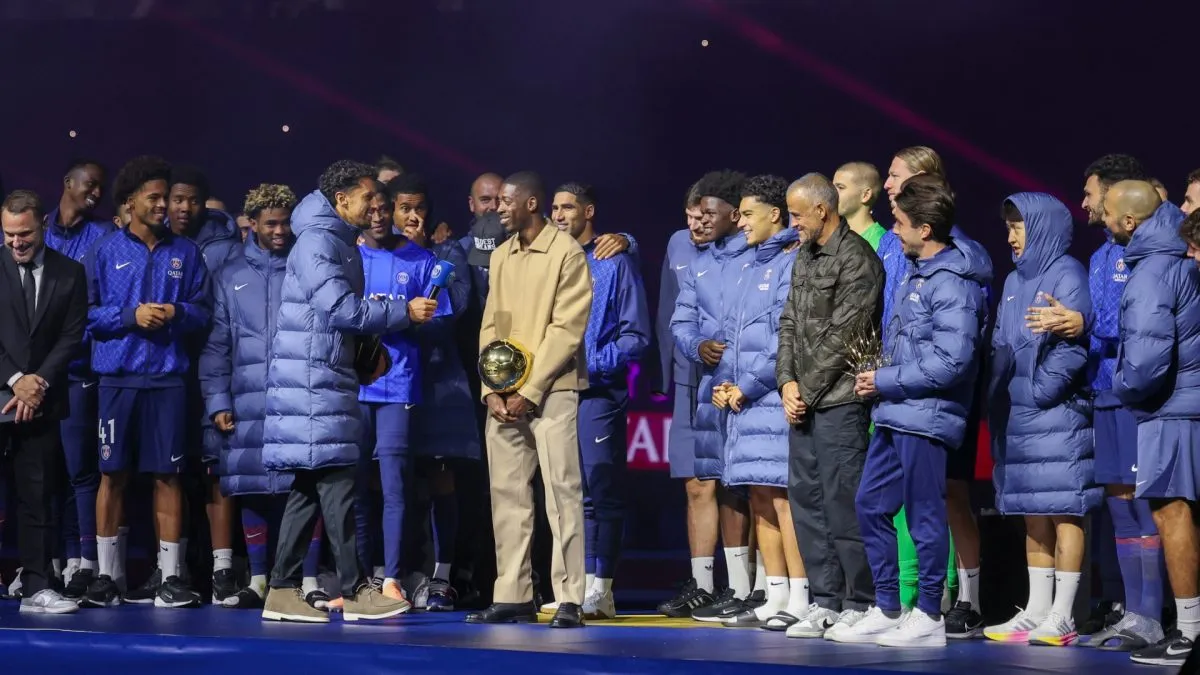 Paris Saint-Germain players present the trophies of Best Club, Ballon d'Or and Best Coach.
