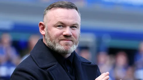 Manchester United legend Wayne Rooney acknowledges the fans following the Premier League match.
