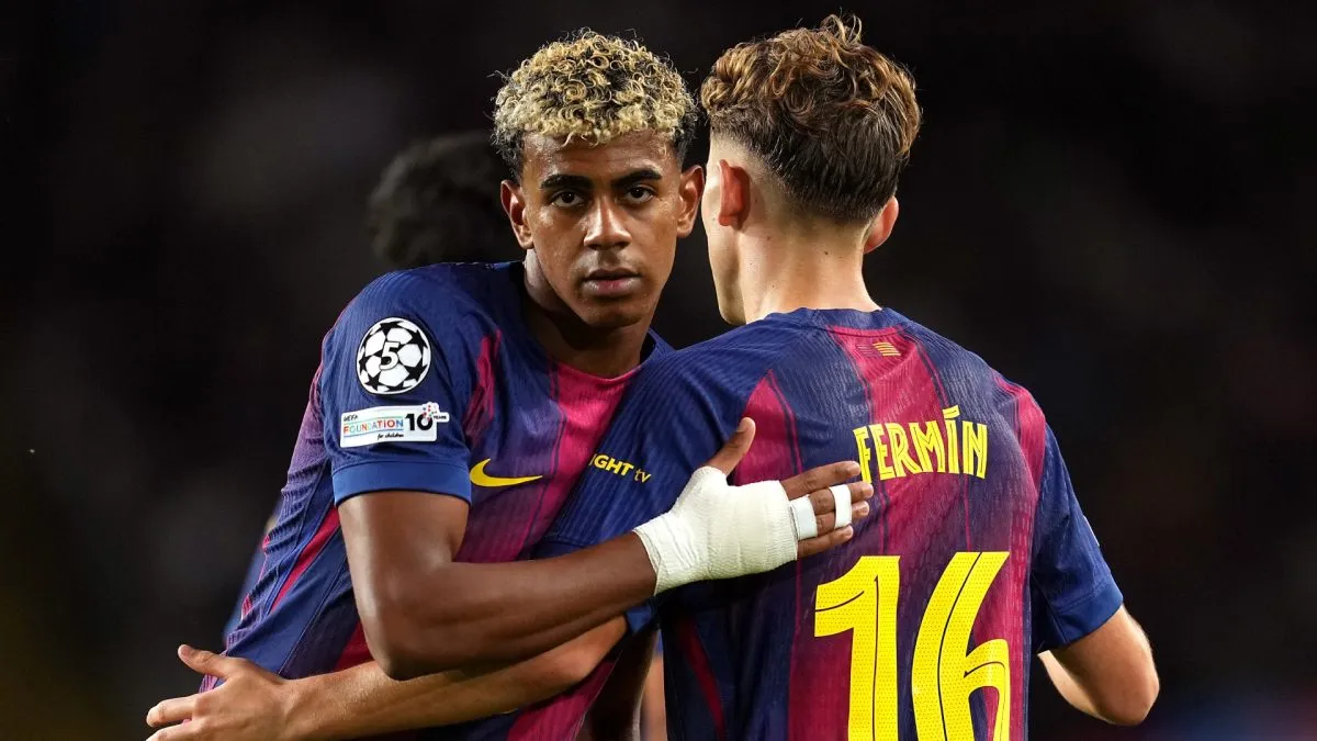 Fermin Lopez of FC Barcelona celebrates scoring his team's second goal with teammate Lamine Yamal.