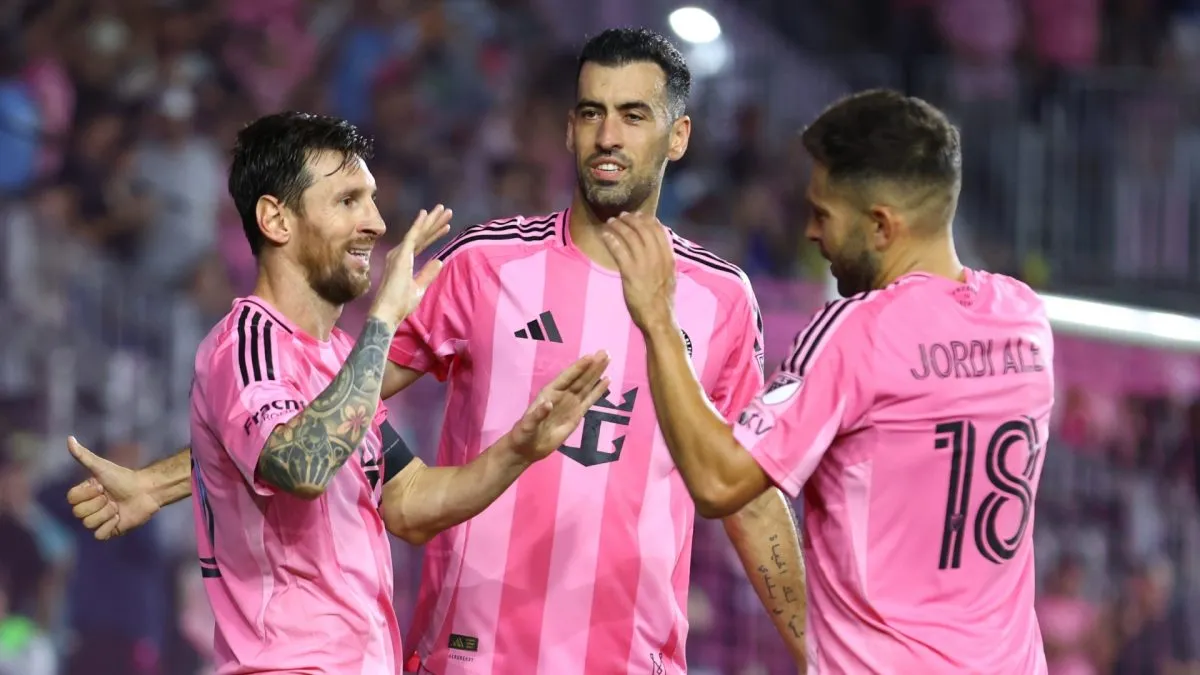 Lionel Messi #10 of Inter Miami CF celebrates with Jordi Alba #18 and Sergio Busquets #5.