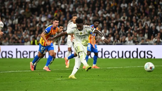Vinicius Junior of Real Madrid has a penalty saved by Julen Agirrezabala of Valencia CF.