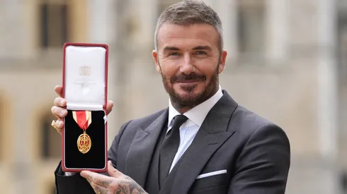Sir David Beckham poses after he was made a Knight Bachelor.