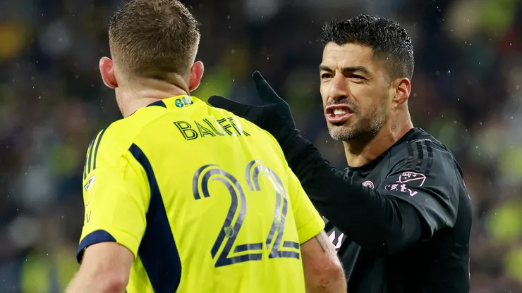 Luis Suarez #9 of Inter Miami CF clashes with Josh Bauer #22 of Nashville SC