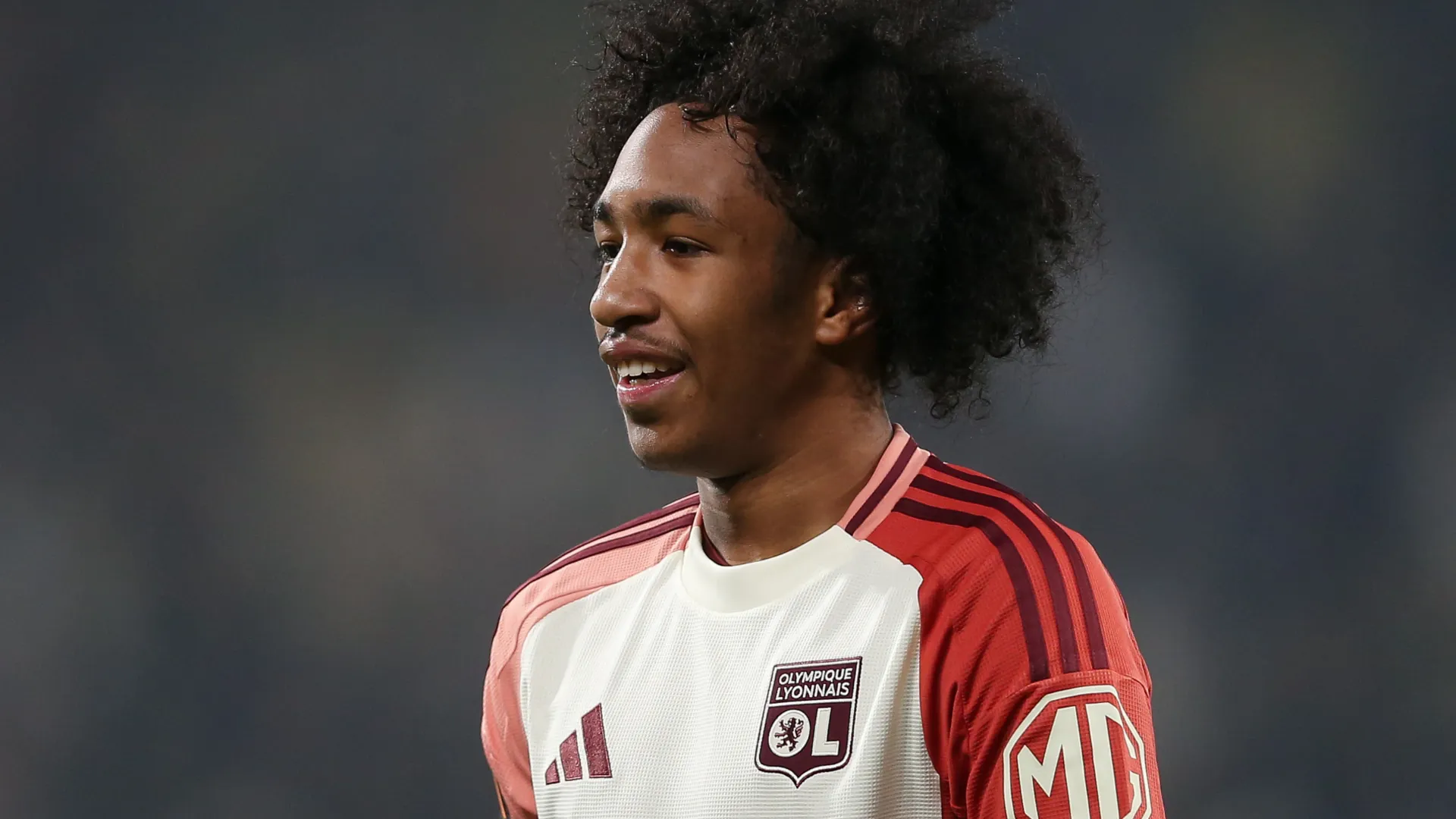 Olympique Lyonnais star Malick Fofana looking on