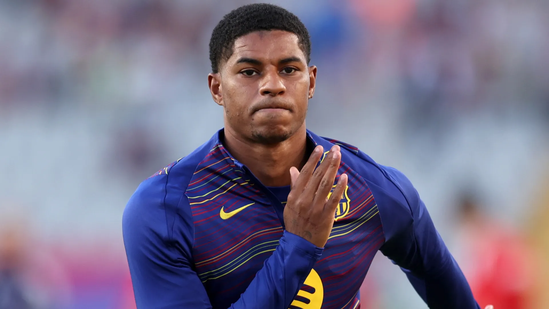 Barcelona star Marcus Rashford warming up
