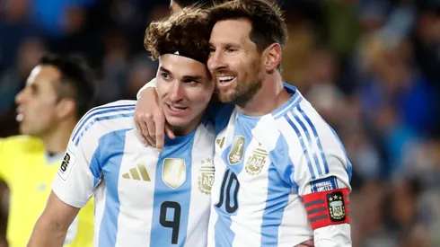 Lionel Messi of Argentina celebrates with teammate Julian Alvarez.