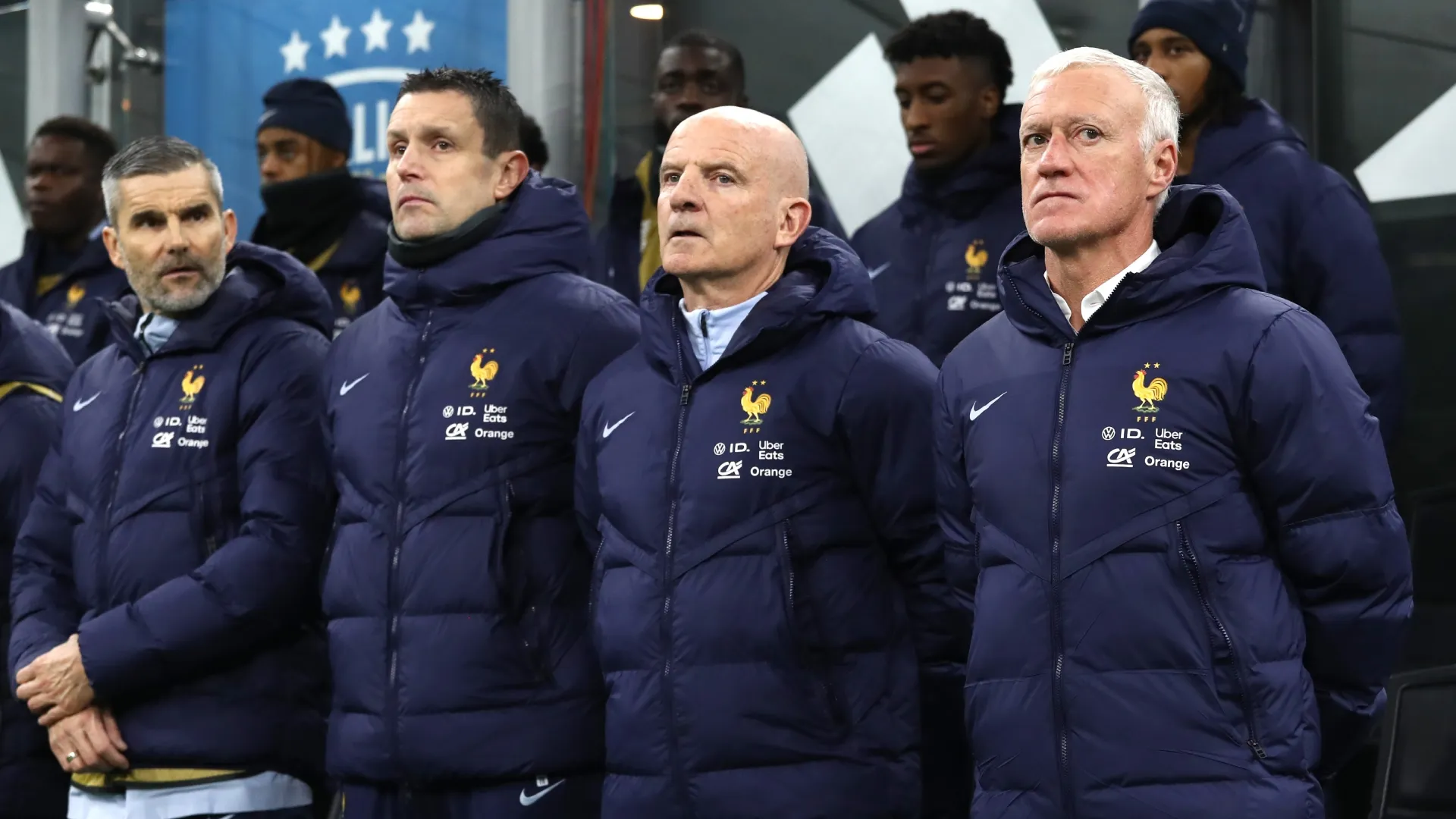 Didier Deschamps, Head Coach of France, lines up with coaching staff.