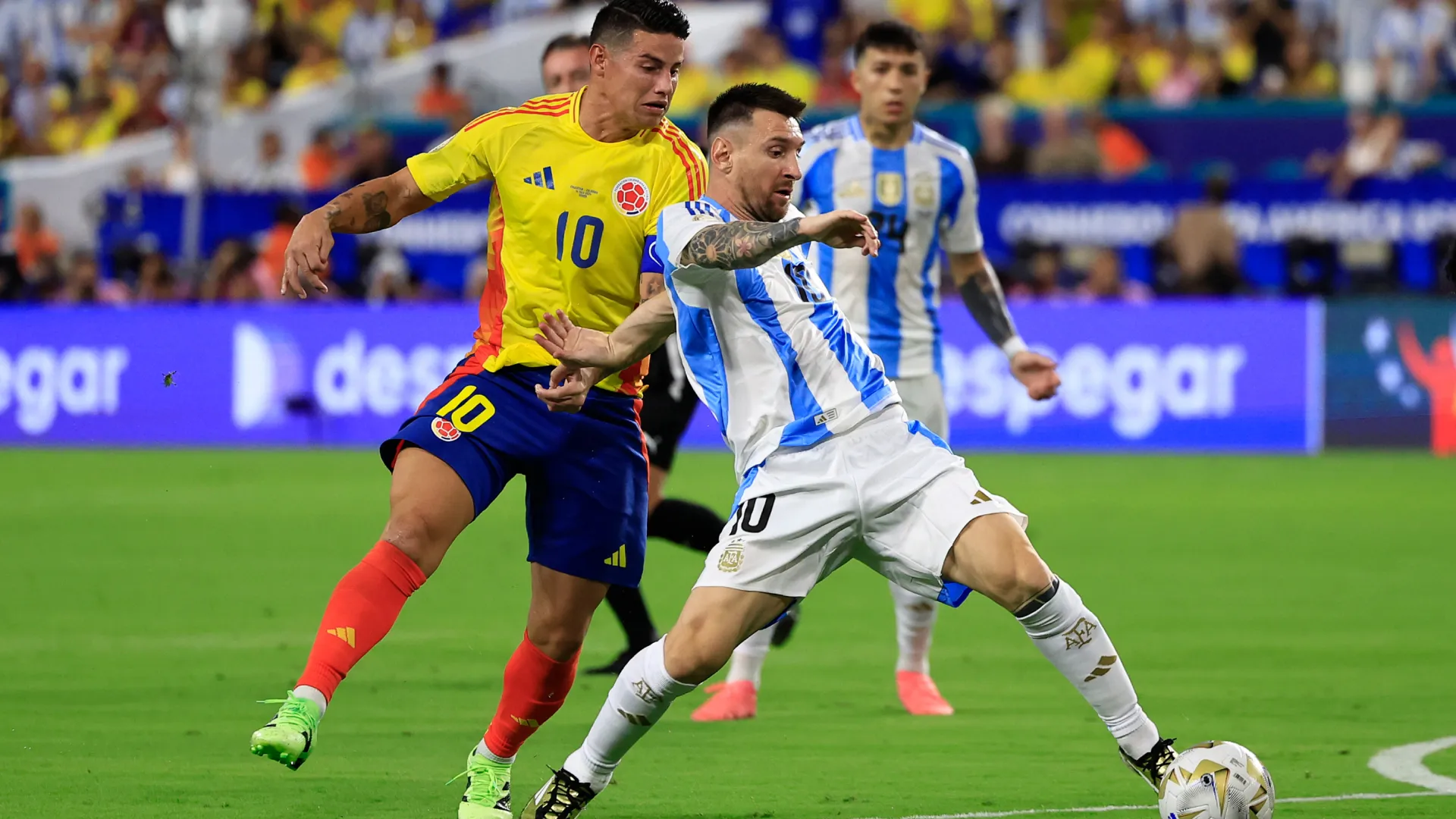 James Rodriguez and Lionel Messi