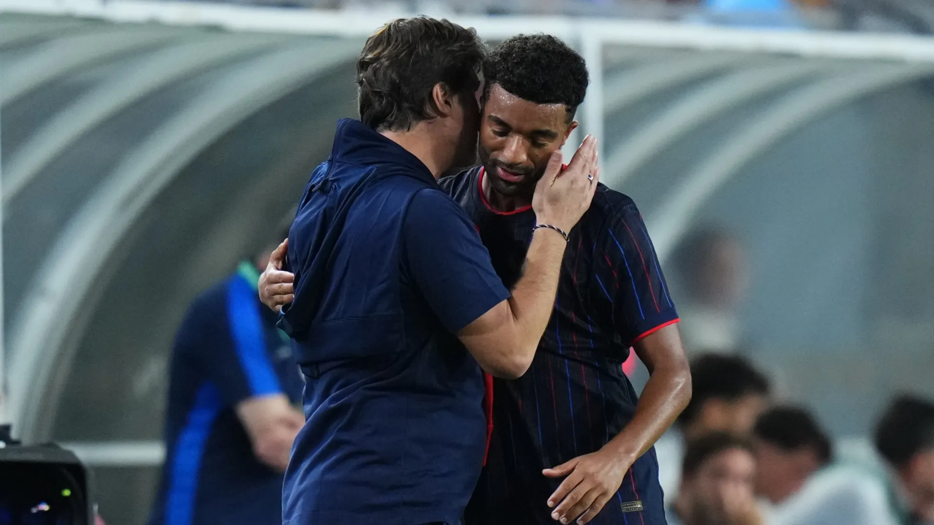 Timmy Tillman #14 of the United States speaks to head coach Mauricio Pochettino.