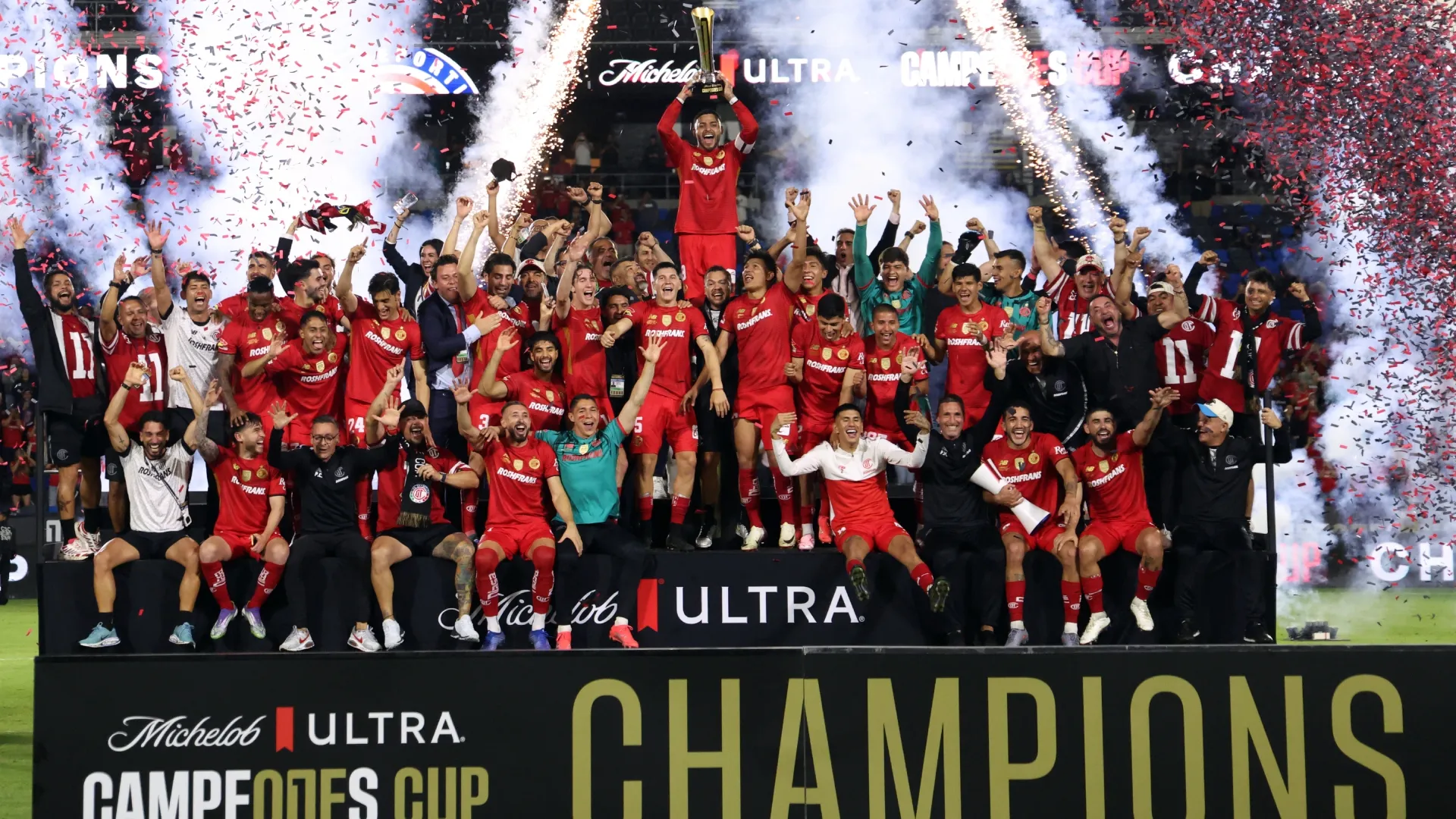 Toluca celebrating with the 2025 Campeones Cup trophy.