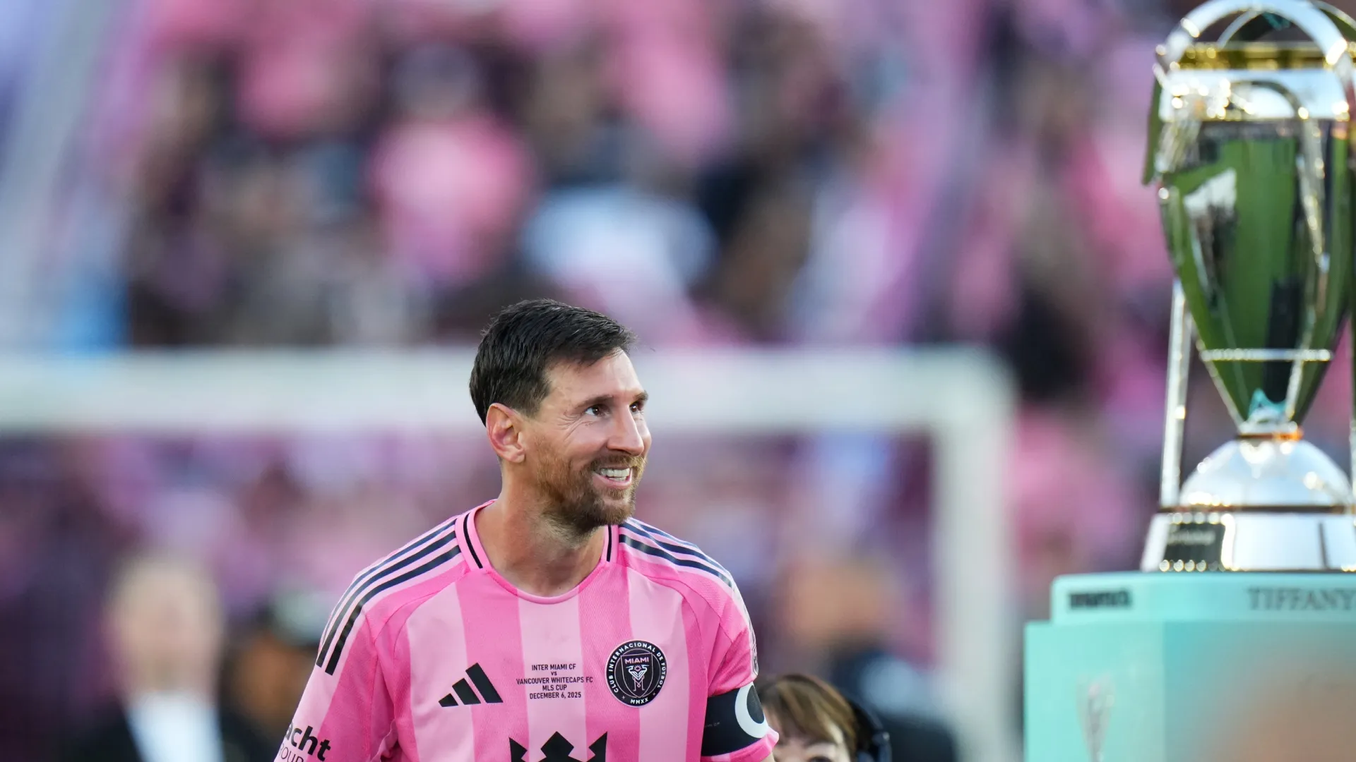 Lionel Messi #10 of Inter Miami CF sees the 2025 MLS Cup trophy.