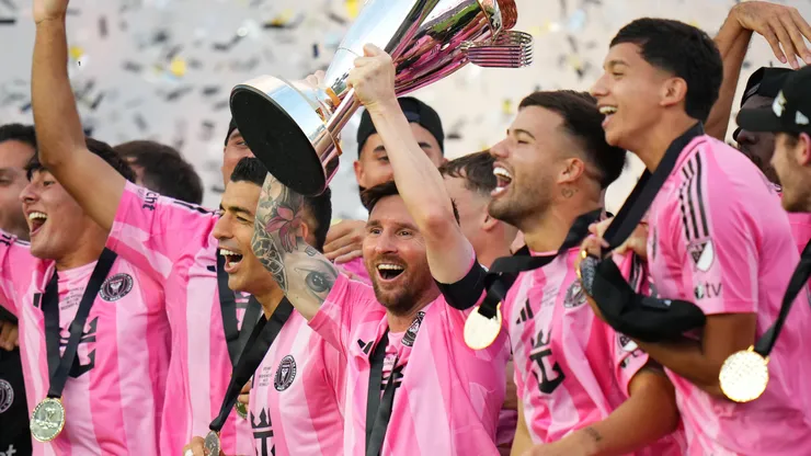 Lionel Messi #10 of Inter Miami CF lifts the Champion's trophy