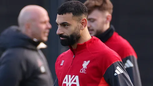 Mohamed Salah of Liverpool looks on as Arne Slot, Manager of Liverpool, is seen during a Liverpool Training Session.