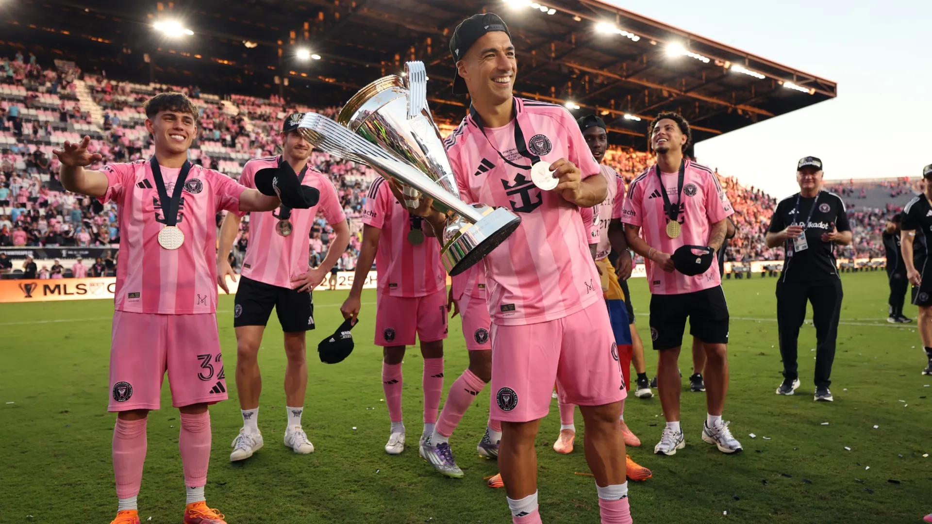 Luis Suárez #9 of Inter Miami CF poses with the 2025 MLS Cup trophy.