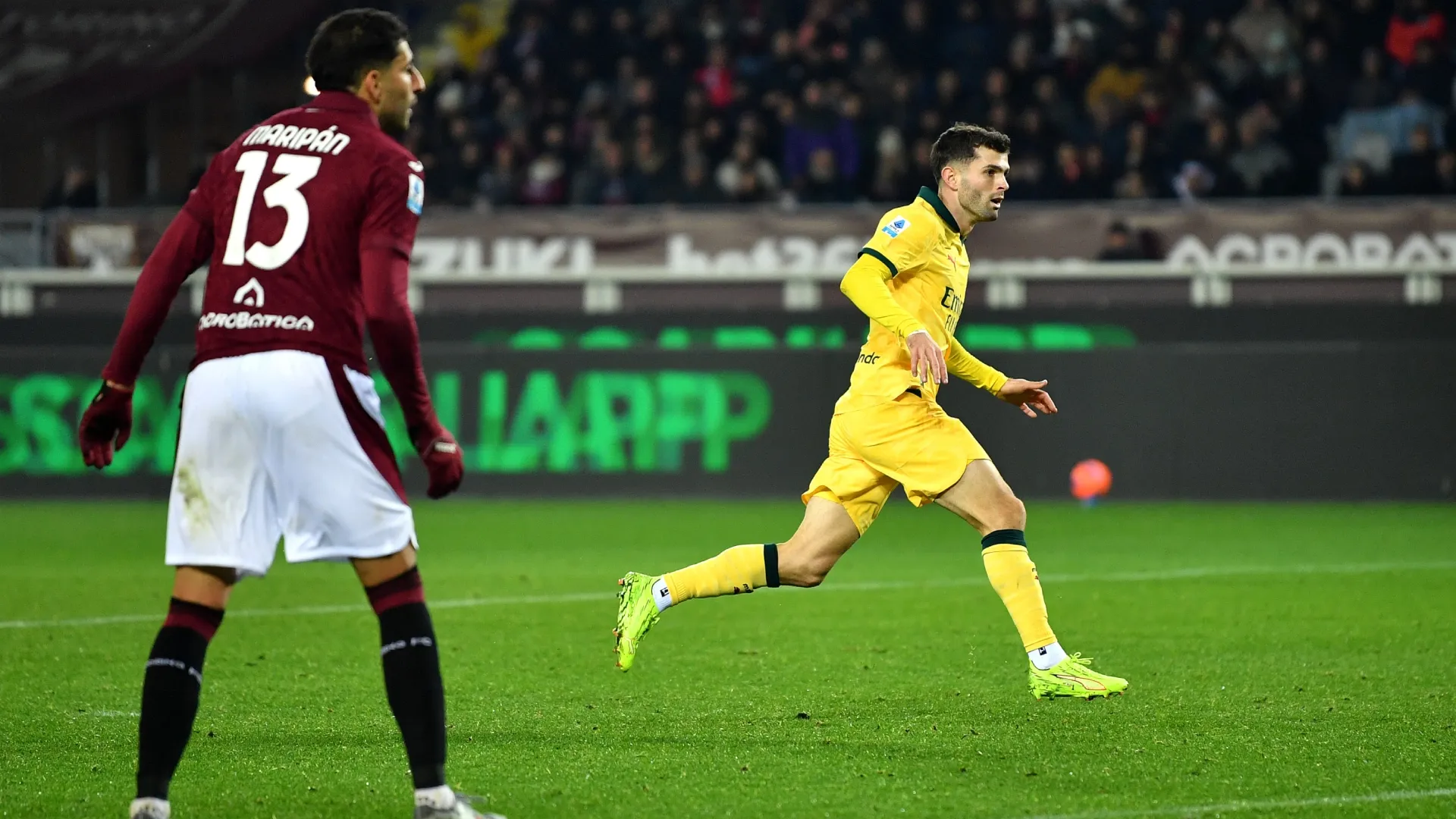 Christian Pulisic of AC Milan celebrates scoring against Torino.