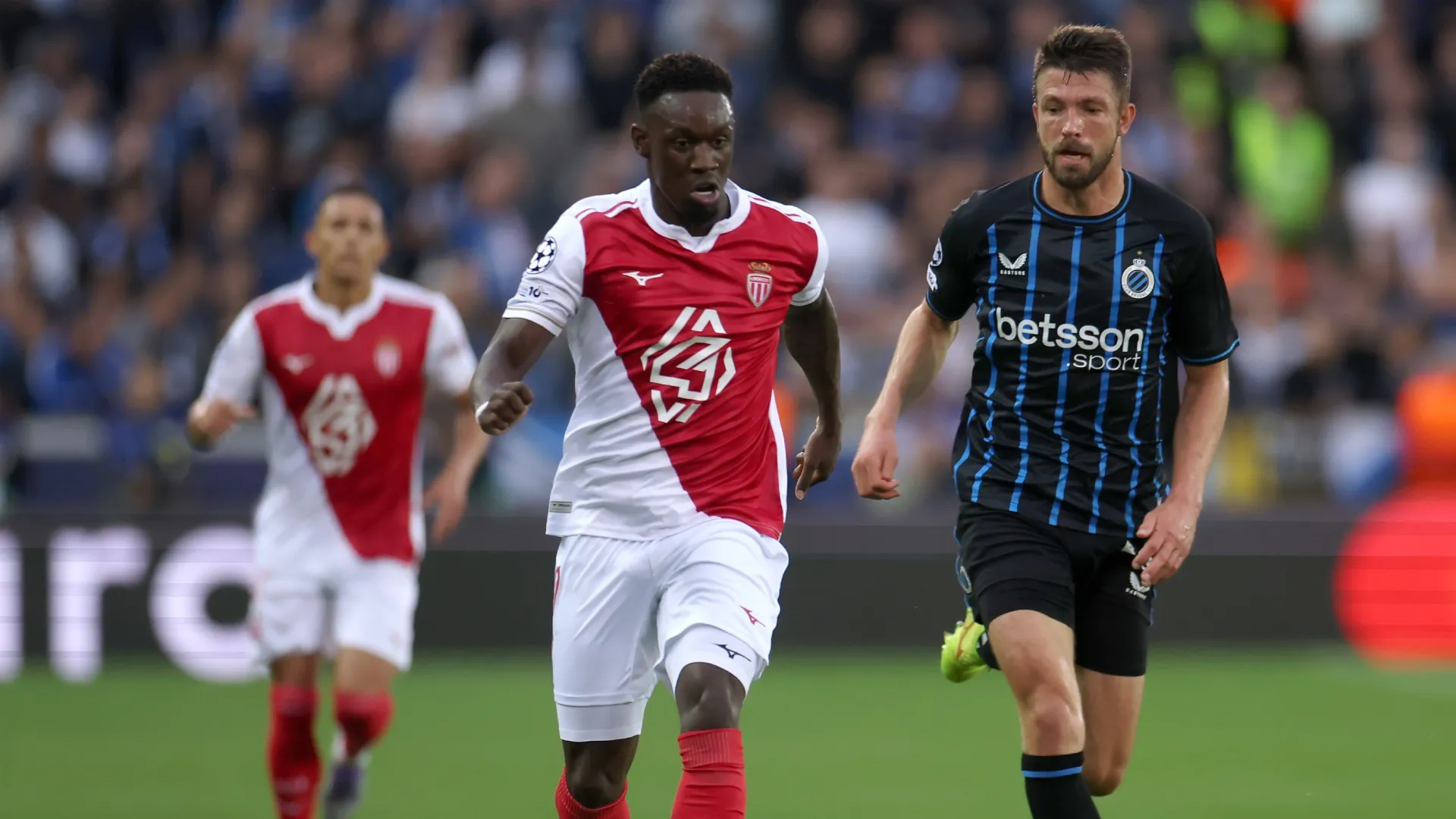 Folarin Balogun of AS Monaco battles for the ball with Brandon Mechele of Club Brugge.