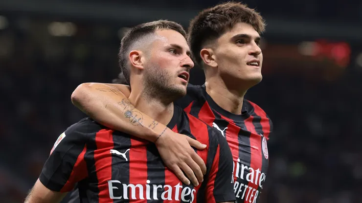 Santiago Gimenez of AC Milan celebrates a goal with Davide Bartesaghi.