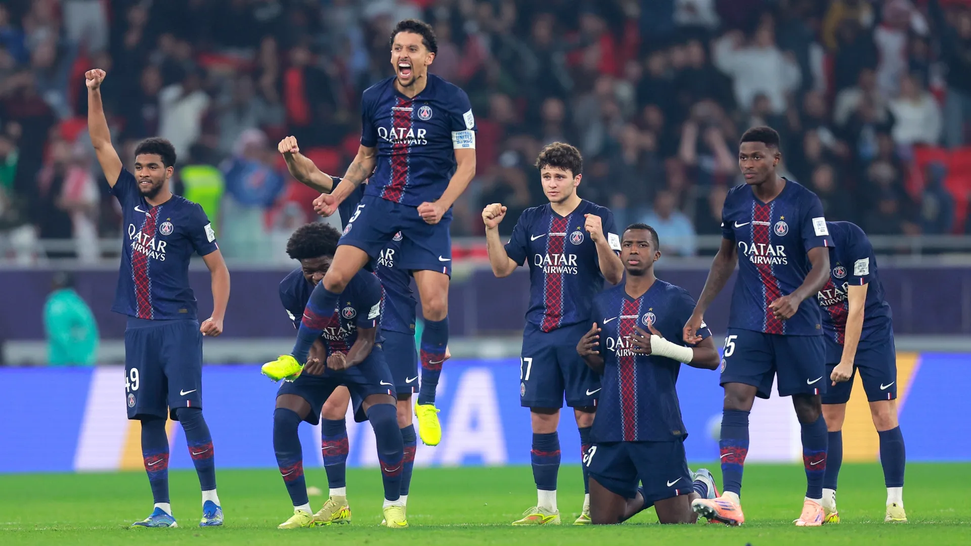 Paris Saint-Germain players celebrate during the penalty shoot out.