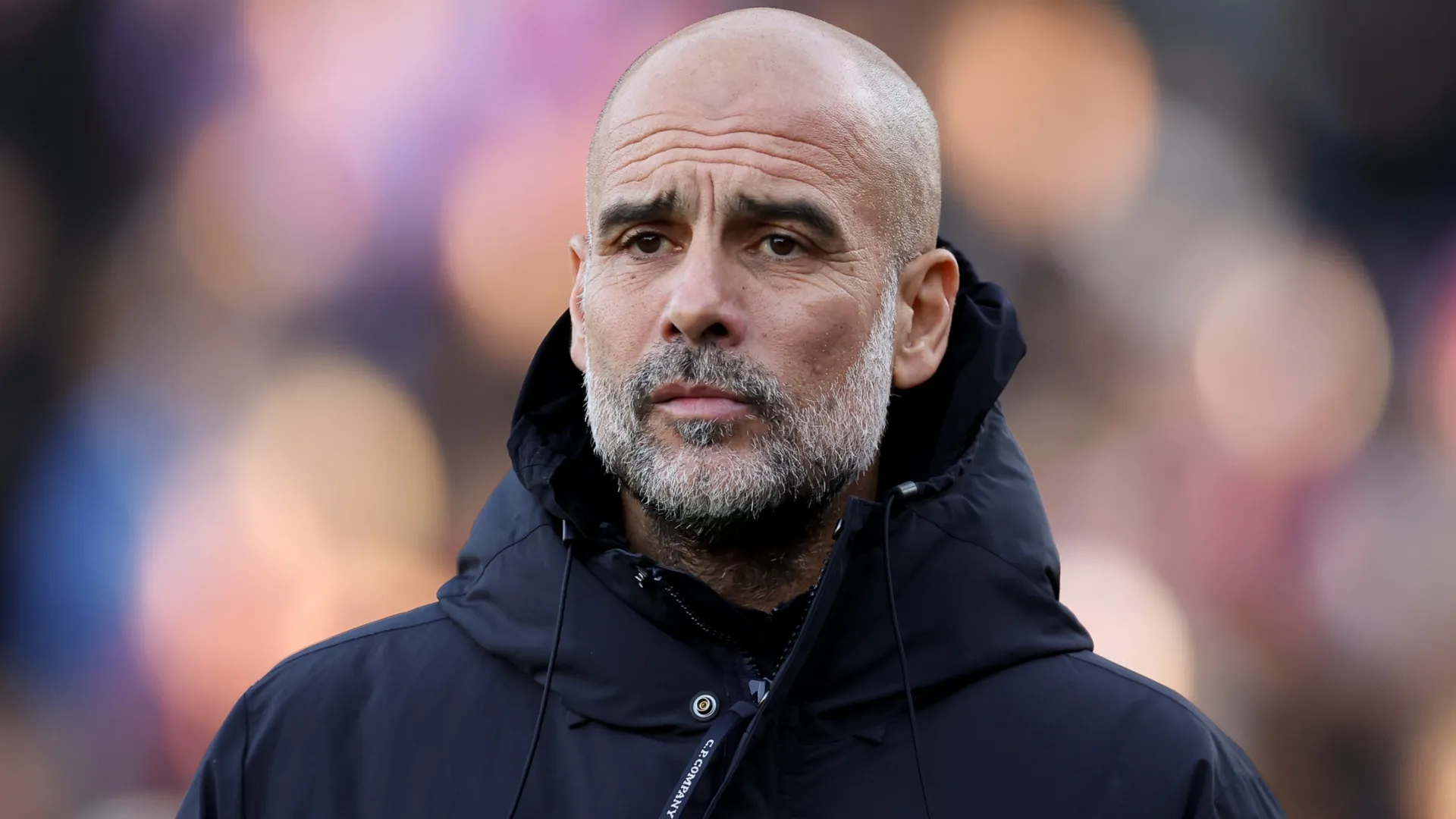 Manchester City's Pep Guardiola looks on