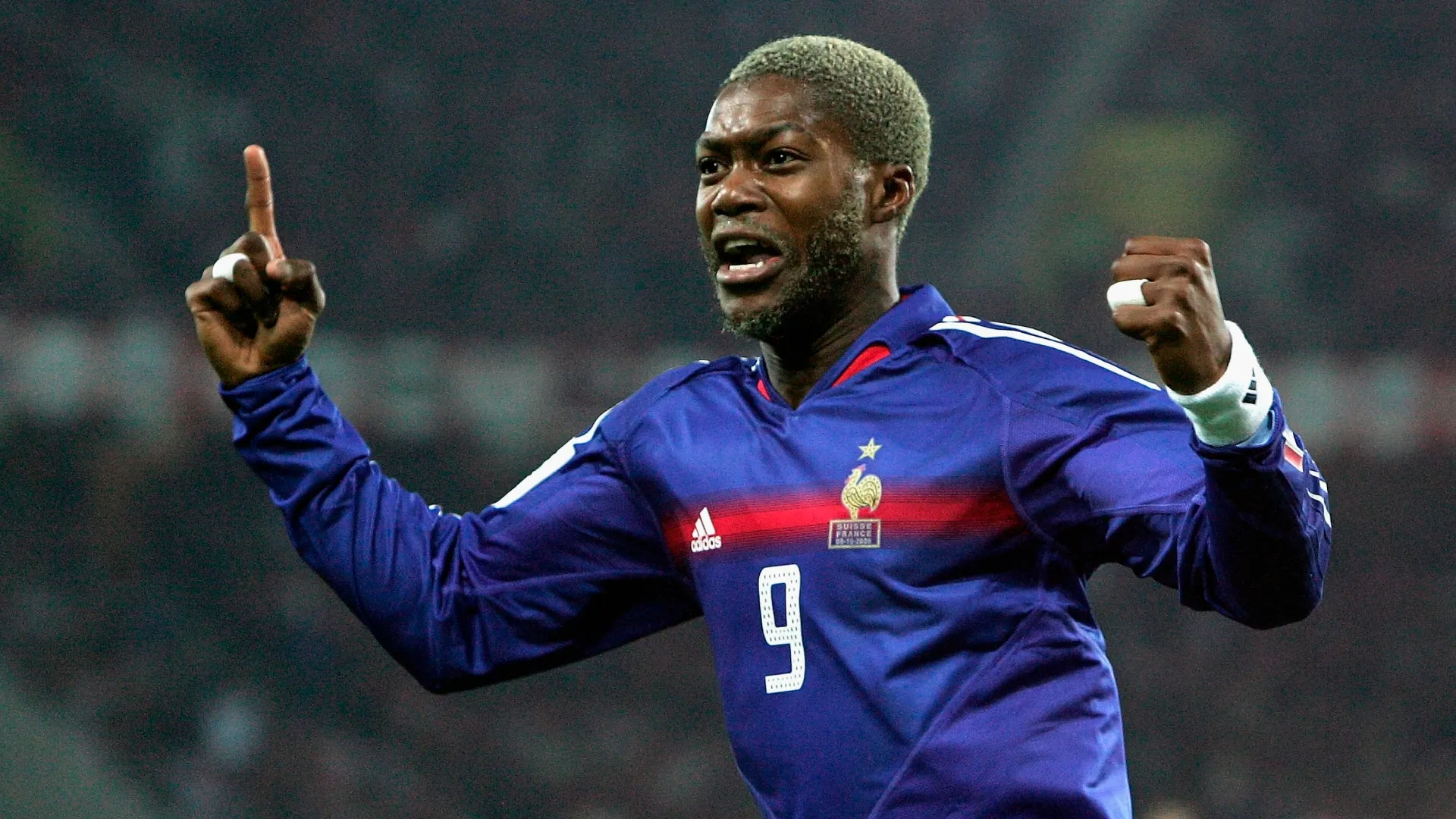 Djibril Cisse of France celebrating.