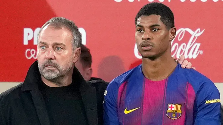 Hansi Flick, Head Coach of FC Barcelona, prepares Marcus Rashford as substitute during the LaLiga EA Sports match.