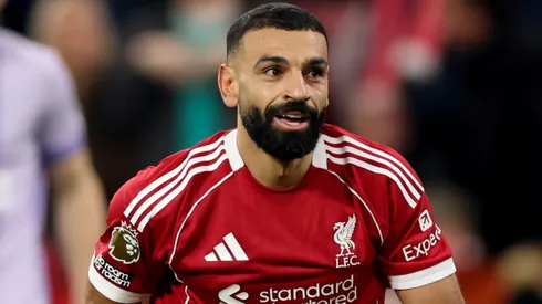 Mohamed Salah of Liverpool gets up off the floor during the Premier League match.