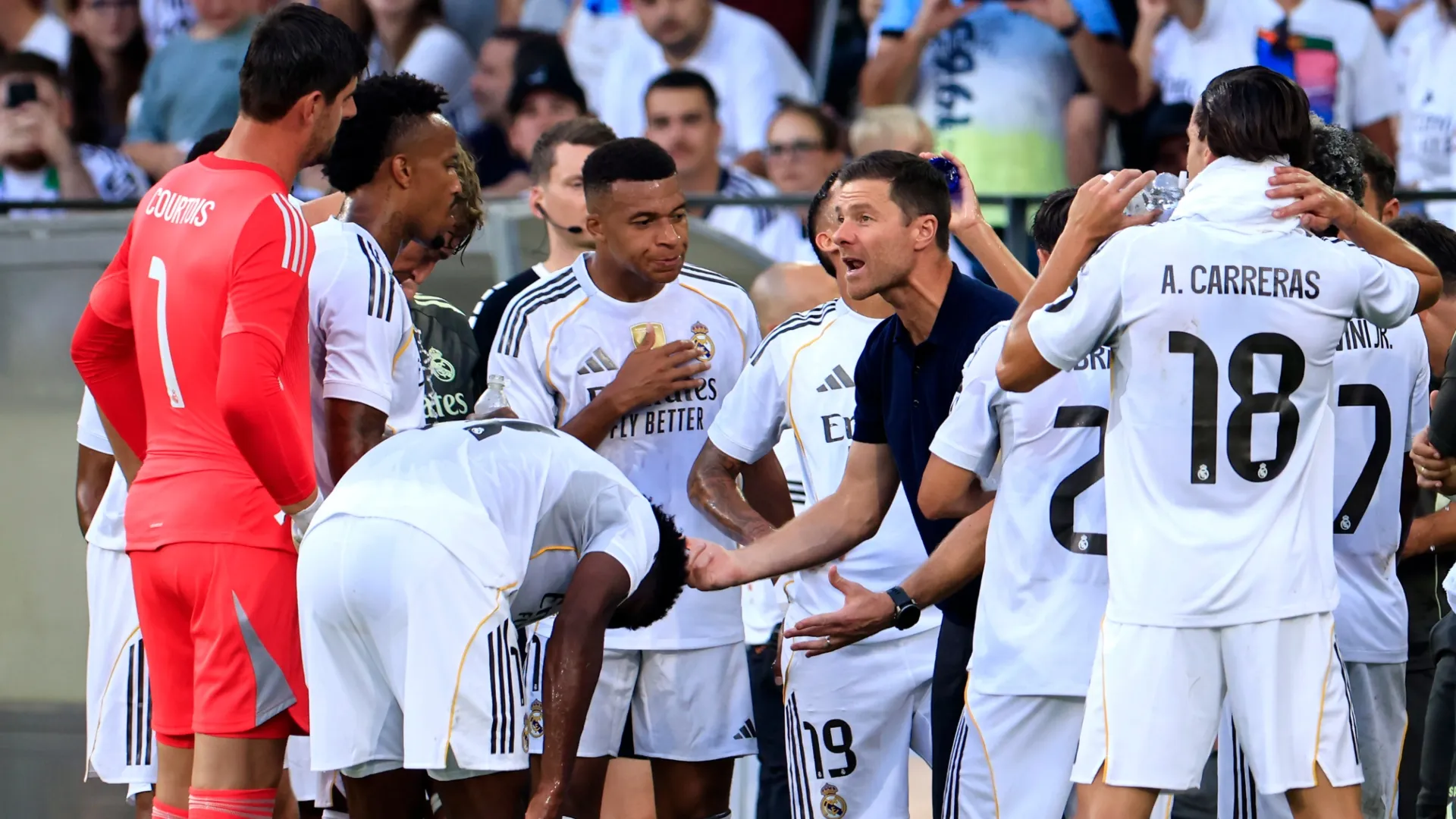 Real Madrid's Xabi Alonso talking to his players