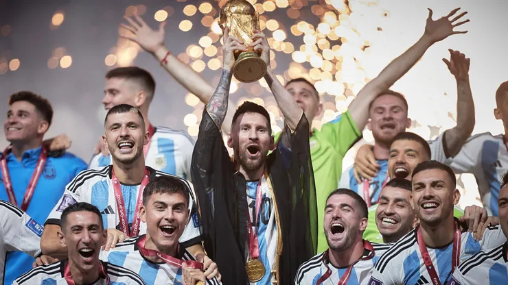 Lionel Messi of Argentina lifts the FIFA World Cup Qatar 2022 Winner's Trophy.
