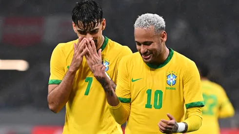 Neymar Jr. of Brazil celebrates scoring his side's first goal with his teammate Lucas Paqueta