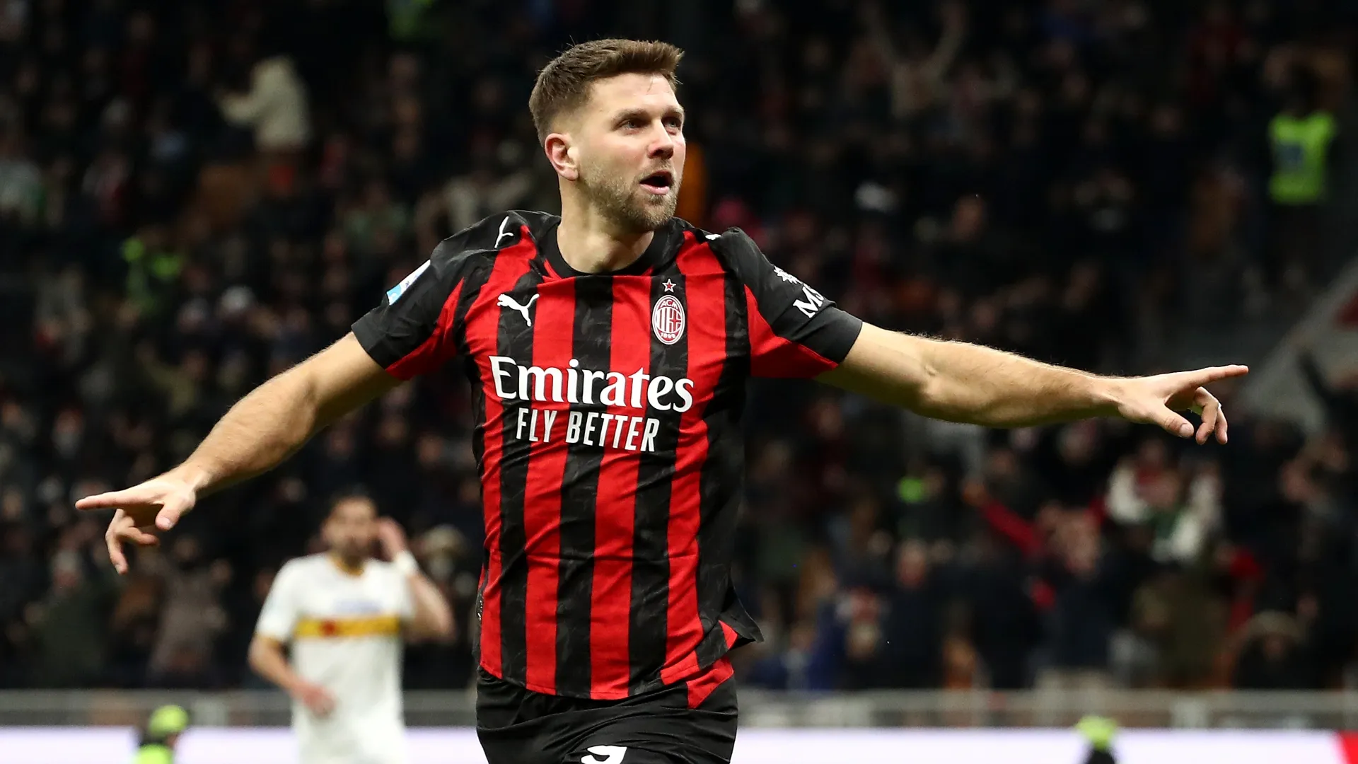 Niclas Fuellkrug of AC Milan celebrates scoring against Lecce.