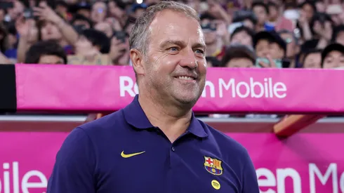 FC Barcelona's coach Hansi Flick smiling.