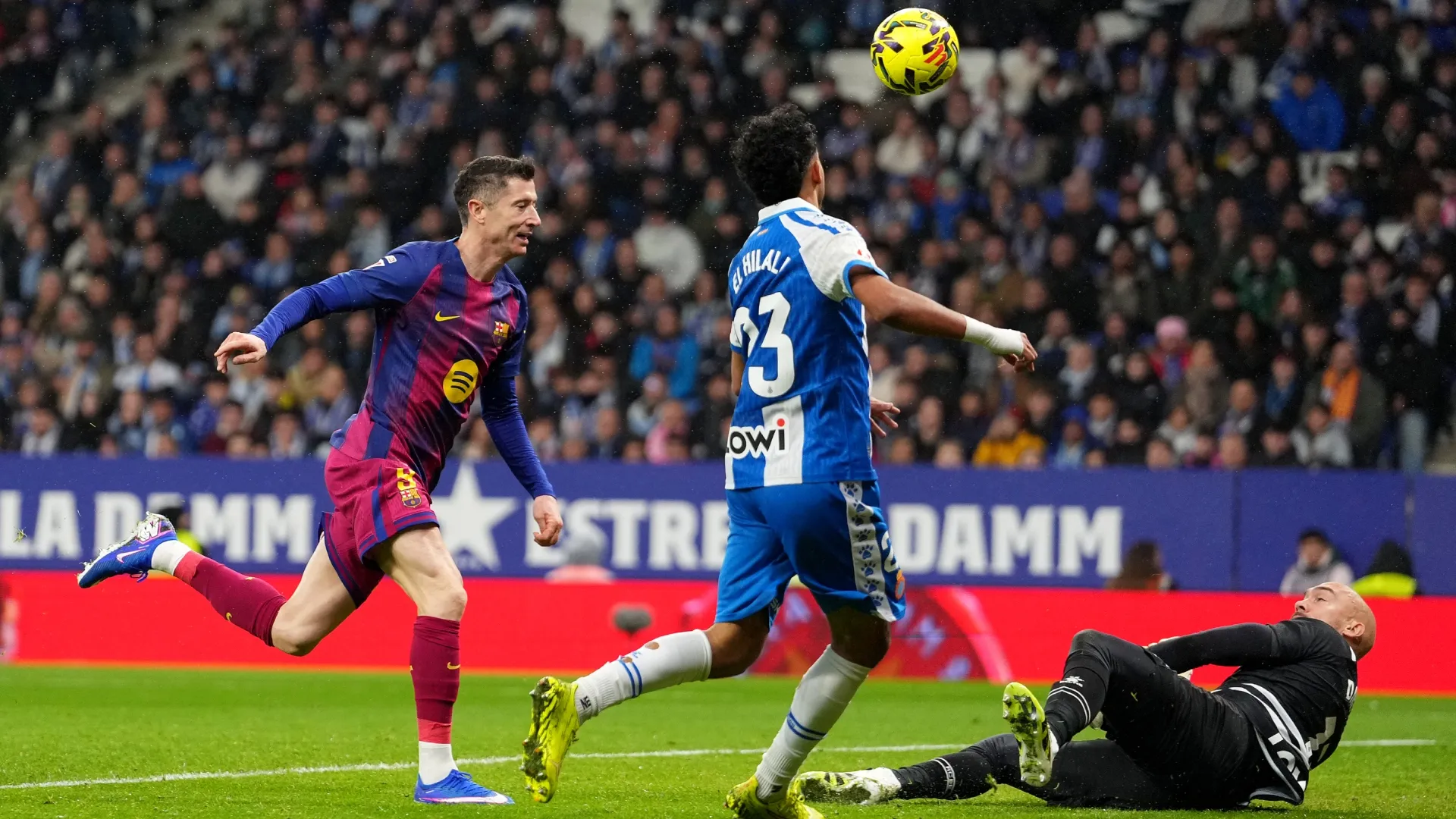 Barcelona's Robert Lewandowski scoring against RCD Espanyol