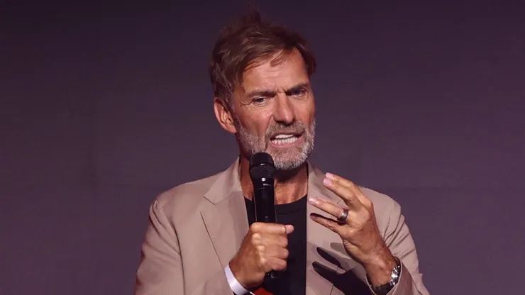 Jürgen Klopp presents the "Legende" award to Boris Becker onstage at the SPORT BILD Awards.