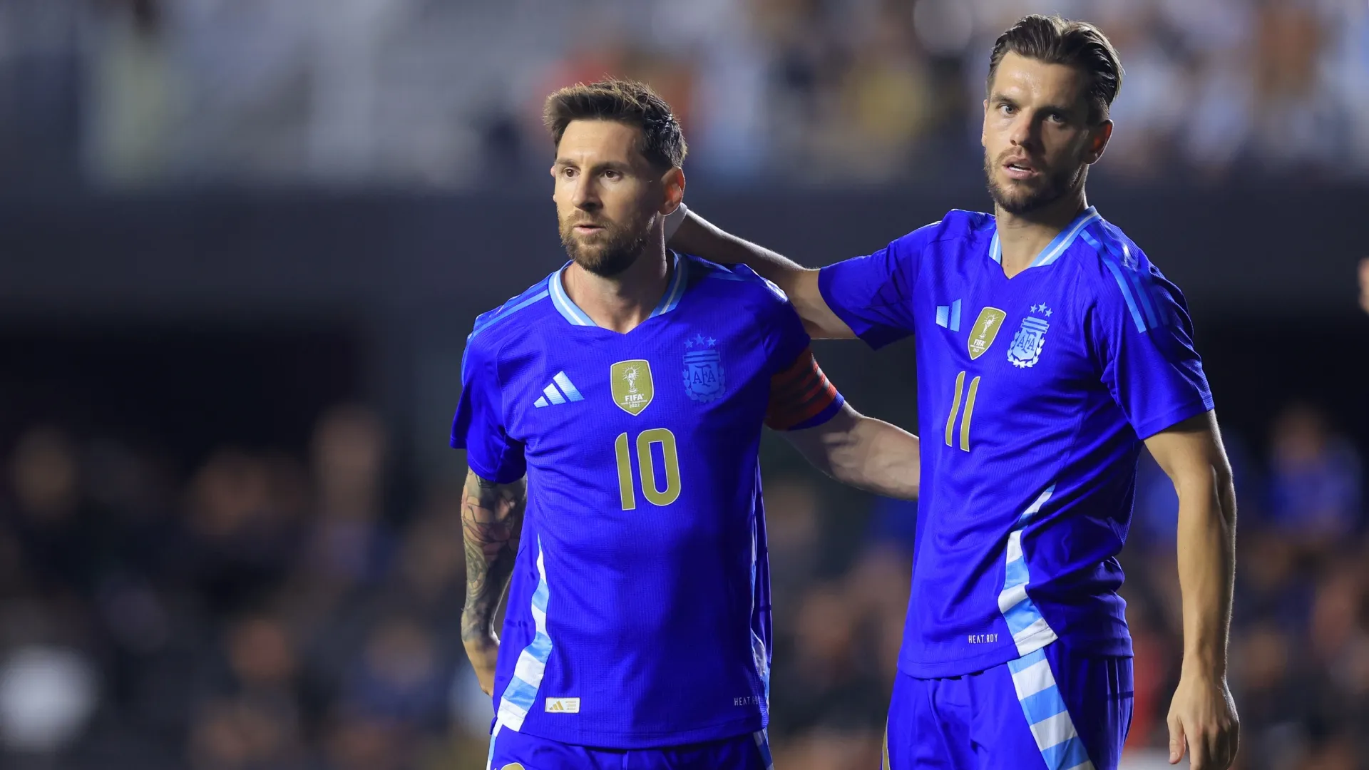 Lionel Messi and Giovani Lo Celso playing for Argentina in 2025.