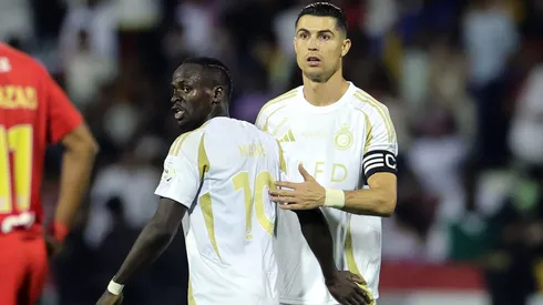 Sadio Mane of Al Nassr celebrates scoring his team's first goal with teammate Cristiano Ronaldo